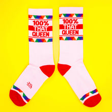 Load image into Gallery viewer, Pink crew socks with red heel and toe featuring “100% That Queen” text and colorful geometric pattern.