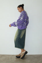 Load image into Gallery viewer, Stay cozy and comfortable in this colorful bandana-inspired sweater. Featuring a relaxed fit, this piece can be dressed up or down as desired. Show off your vibrant, trendy style in this cozy, soft purple paisley printed sweater. It’s the perfect piece to wear around town on a cold day, whether you&#39;re out with friends or relaxing at home.
