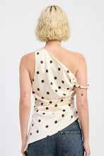 Load image into Gallery viewer, Person wearing a one-shoulder polka dot top and jeans on a white background