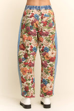 Load image into Gallery viewer, Floral tapestry panel straight-leg denim pants with vintage botanical pattern and contrast blue denim side panels.