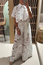 Load image into Gallery viewer, Person wearing a white lace outfit in an indoor setting.