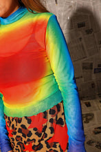 Load image into Gallery viewer, Turn heads in the Prism Heat Mesh Top. A vibrant rainbow mesh top with a flattering mock neck and stretch fit that's perfect for layering all year long.