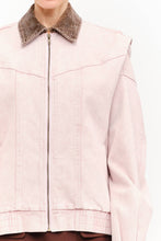 Load image into Gallery viewer, Model wearing an oversized dusty rose denim jacket with contrasting brown corduroy collar, front zipper and relaxed silhouette.