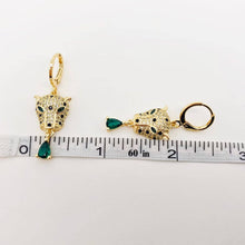 Load image into Gallery viewer, Gold-plated leopard head huggie earrings with crystal details, green eyes and dangling emerald-green teardrop cubic zirconia stones.