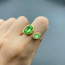 Load image into Gallery viewer, Adjustable 18K gold-plated stainless steel open ring featuring two asymmetrical faceted green zircon stones.