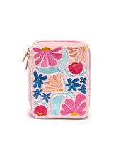 Load image into Gallery viewer, Pink velvet travel jewelry case with colorful embroidered flowers and zip-around closure.