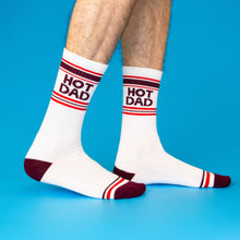 Load image into Gallery viewer, White Hot Dad gym crew socks featuring burgundy HOT DAD lettering, retro red and burgundy athletic stripes, and contrasting burgundy heels and toes.