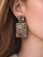Load image into Gallery viewer, Ornate gold drop statement earrings with embossed texture and multicolor gemstone accents in red, green, blue, and crystal tones.