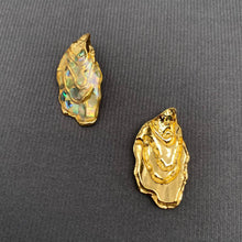 Load image into Gallery viewer, Iridescent shell statement earrings with an organic sculptural shape and 18K gold-plated stainless steel detailing.