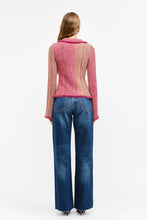 Load image into Gallery viewer, Person wearing a Glam Expressway pink sweater and blue jeans on a white background