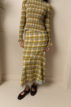 Load image into Gallery viewer, Yellow plaid midi skirt with lace trim hem worn by model.