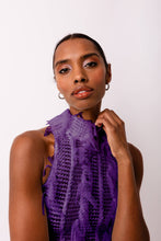 Load image into Gallery viewer, Purple high-neck midi dress with textured ruffles and fitted silhouette worn by model.