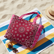 Load image into Gallery viewer, Berry pink oversized tote bag featuring an allover bandana print design with sturdy shoulder straps and a spacious open interior, displayed on a white background.