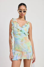 Load image into Gallery viewer, Woman wearing a tie-dye dress with ruffled sleeves against a plain background