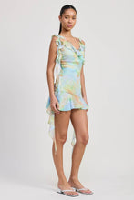 Load image into Gallery viewer, Woman wearing a colorful dress on a white background