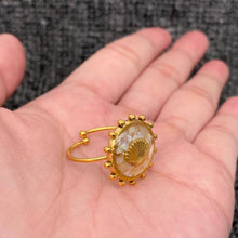 Load image into Gallery viewer, Adjustable 18K gold-plated stainless steel ring with a round shattered-shell mosaic face and raised gold scallop shell detail.