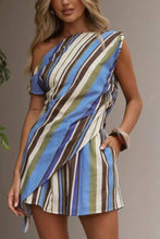 Load image into Gallery viewer, Blue and green striped relaxed fit shorts with a flowy silhouette, worn by a model.
