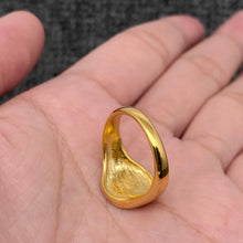 Load image into Gallery viewer, 18K gold-plated stainless steel signet ring engraved with “The World Is Yours” and finished with a high-polish surface.