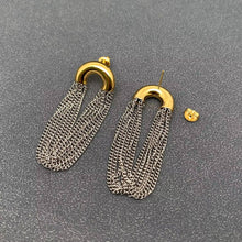 Load image into Gallery viewer, Two-tone chain fringe drop earrings with polished 18K gold-plated curved tops and cascading silver-tone stainless steel chains.