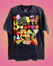 Load image into Gallery viewer, Black oversized graphic t-shirt with colorful food-themed illustration and “You’ve Got Good Taste” text on front.