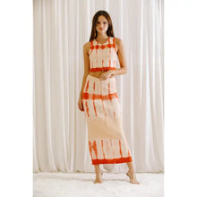 Load image into Gallery viewer, This tie dyed maxi skirt is a must-have for summer. With an orange and cream color scheme, this pencil skirt features a flattering silhouette, high waist and fitted body. This pencil skirt is perfect for your favorite day parties or hang outs in the summer time and throughout the year. Our tie dyed maxi pencil skirt is the perfect blend of casual and chic! 
