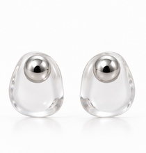 Load image into Gallery viewer, Clear transparent lucite statement earrings with rounded sculptural shapes and polished silver-tone sphere accents.
