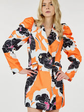 Load image into Gallery viewer, Glam Expressway's Orange puff sleeve Blazer Dress is a show stopper! This dress is orange and printed with black and white florals. This fun dress is double breasted with gold toned buttons and a pop of color for an elevated look. Wear this gorgeous and stylish dress to dinner parties and rooftops all Summer long!