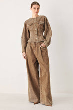 Load image into Gallery viewer, Women's vintage-washed brown denim jacket with a collarless round neckline, button front, chest pockets and sculpted fitted waist.