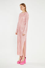 Load image into Gallery viewer, Step into timeless elegance with our Pink Plisse Maxi Dress. This stunning piece features long sleeves and a beautifully textured plisse fabric that drapes effortlessly. Its retro-inspired design exudes femininity, making it perfect for both day and evening occasions. Whether you're attending a garden party or a chic dinner, this dress ensures you make a graceful statement every time.
