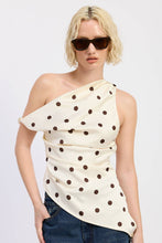 Load image into Gallery viewer, Woman wearing a one-shoulder polka dot top and sunglasses on a white background