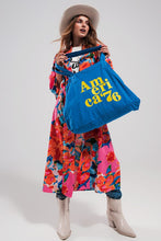 Load image into Gallery viewer, This America 76 Canvas Tote is a durable cotton canvas tote that has been made with a plain design and yellow text over the front. It has two urban twin handles, which help to give this bag a unique style. This bag is perfect for walking the dog, heading out to the beach with friends or going on a trip because of its durable design and open top concept. Made from durable 100% cotton canvas, and featuring an open top concept for convenient access, this roomy bag is ideal for everyday use.