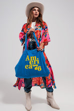 Load image into Gallery viewer, This America 76 Canvas Tote is a durable cotton canvas tote that has been made with a plain design and yellow text over the front. It has two urban twin handles, which help to give this bag a unique style. This bag is perfect for walking the dog, heading out to the beach with friends or going on a trip because of its durable design and open top concept. Made from durable 100% cotton canvas, and featuring an open top concept for convenient access, this roomy bag is ideal for everyday use.