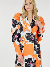 Load image into Gallery viewer, Glam Expressway&#39;s Orange puff sleeve Blazer Dress is a show stopper! This dress is orange and printed with black and white florals. This fun dress is double breasted with gold toned buttons and a pop of color for an elevated look. Wear this gorgeous and stylish dress to dinner parties and rooftops all Summer long!
