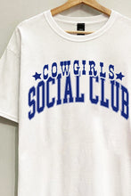 Load image into Gallery viewer, Saddle up in style with our White Cowgirl Social Club Graphic Tee. Crafted from 100% cotton for comfort and breathability, this short sleeve tee features an oversized &quot;COWGIRLS SOCIAL CLUB&quot; graphic, making a bold statement wherever you go. Whether you&#39;re hitting the rodeo or simply embracing the western spirit, this tee is sure to be a wardrobe favorite.
