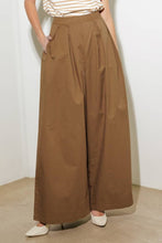 Load image into Gallery viewer, Elevate your wardrobe with these chic Wide-Leg Beige Pleated Pants! Designed with front and back pleats for a sophisticated touch, these solid woven pants feature convenient side pockets, a discreet side zipper closure, and a flowing wide-leg silhouette. Perfect for both office elegance and weekend outings, these versatile pants are a must-have for effortless style and comfort. Dress them up with heels or keep it casual with flats—the possibilities are endless!
