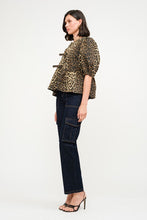 Load image into Gallery viewer, This Leopard Denim Blouse with Front Ties is a statement piece that’s as fierce as it is versatile. Perfect for creating bold, fashion-forward looks.
