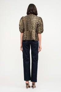 This Leopard Denim Blouse with Front Ties is a statement piece that’s as fierce as it is versatile. Perfect for creating bold, fashion-forward looks.