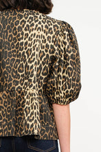 Load image into Gallery viewer, This Leopard Denim Blouse with Front Ties is a statement piece that’s as fierce as it is versatile. Perfect for creating bold, fashion-forward looks.
