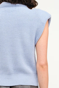 Stay effortlessly chic in our Light Blue Knit Sleeveless Sweater! This stylish piece features a soft knit design in a dreamy shade of blue, perfect for layering or wearing solo. With its versatile, elevated look, it’s a wardrobe essential for any season. For long-lasting wear, hand wash cold and line dry. Available now in sizes S - L!