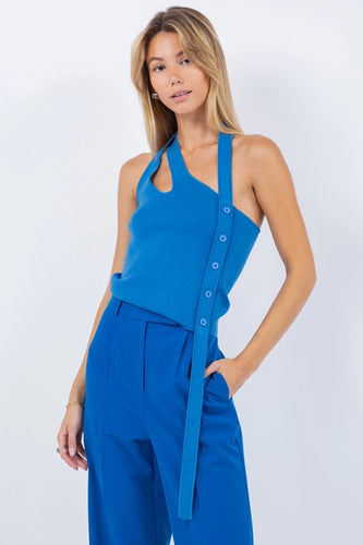 Introducing our Asymmetrical Blue Tank Top with Side Button Detail – the perfect blend of style and comfort! Crafted from soft knit fabric, this tank top ensures a luxurious and gentle feel against your skin. The asymmetrical design adds a trendy twist, while the chic side button detail elevates your fashion game.
