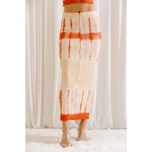 This tie dyed maxi skirt is a must-have for summer. With an orange and cream color scheme, this pencil skirt features a flattering silhouette, high waist and fitted body. This pencil skirt is perfect for your favorite day parties or hang outs in the summer time and throughout the year. Our tie dyed maxi pencil skirt is the perfect blend of casual and chic! 