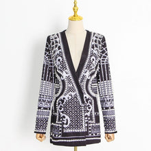 Load image into Gallery viewer, Step up your style game with our Silver Pearl Blazer, a stunning black blazer embellished with elegant pearls and a shimmering silver design. This statement piece exudes modern sophistication and adds an eye-catching flair to any look. Available in sizes S to 2XL, it&#39;s the perfect blend of timeless elegance and bold luxury. Make a lasting impression with every wear, whether you&#39;re heading to a chic event or making a fashion-forward entrance.
