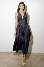 Load image into Gallery viewer, Turn heads in this elegant Solid Denim Corset Midi Dress! Featuring a deep V-neckline and sleeveless design, this dress is all about understated sophistication. The front tie detail and contouring waist accentuate your shape, while the flowing full skirt adds a touch of timeless charm. Perfect for dates, brunches, or evenings out, this versatile midi dress is a must-have for your wardrobe!
