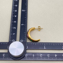 Load image into Gallery viewer, 18K gold-plated C-shaped hoop earrings inlaid with multicolored cubic zirconia stones in pink, purple, green and clear.
