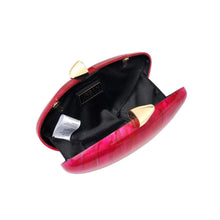 Load image into Gallery viewer, Red clutch bag with gold accents on a white background
