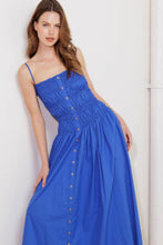 Load image into Gallery viewer, Woman wearing a blue dress with buttons against a white background
