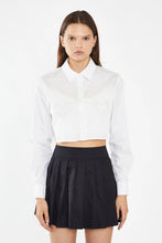 Load image into Gallery viewer, Introducing our Glamorous Women&#39;s White Heart Cut-Out Crop Button Down Shirt, the perfect choice to make a bold and stylish statement at any event! This ultra-cute, cropped button-down is designed to elevate your fashion game and make you the heart of the party. Crafted with attention to detail, the shirt features a chic heart-shaped cut-out that adds a playful and romantic touch to your look.
