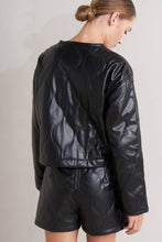 Load image into Gallery viewer, Person wearing a Glam Expressway black leather jacket and shorts on a plain background
