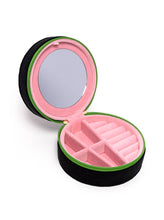 Load image into Gallery viewer, Open black velvet round jewelry organizer with soft pink interior, built-in mirror, ring slots and divided compartments.
