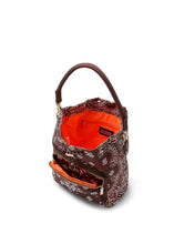 Load image into Gallery viewer, Walnut brown bandana print convertible bucket bag with drawstring closure and adjustable straps that can be worn as a backpack, shoulder bag, or crossbody bag.
